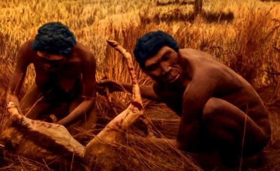 Men butchering a hunted animal